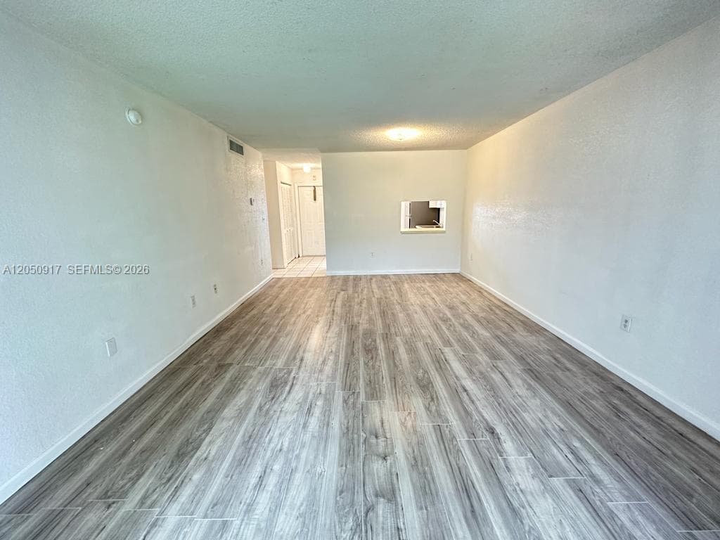 NEW WORLD CONDO APTS IV · #111 in Miami Gardens - Photo 1