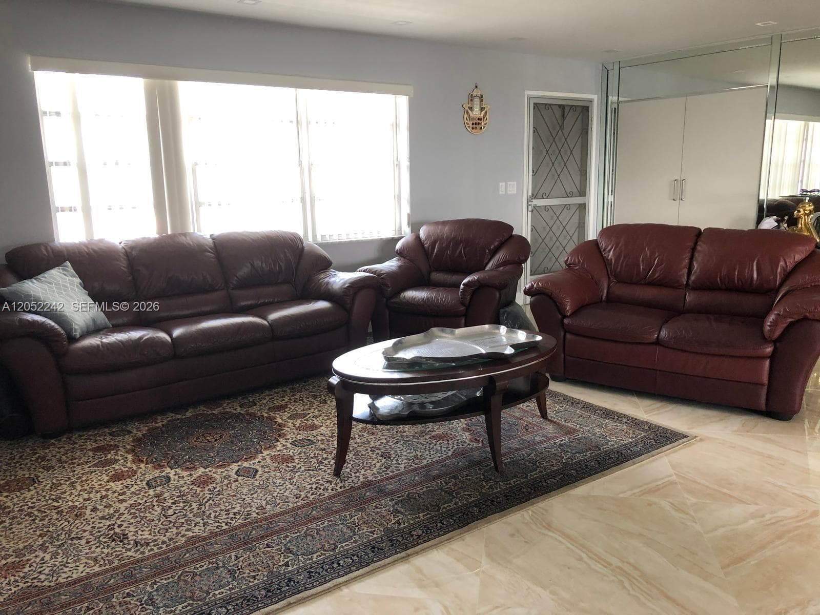 Large closet in bedroom and double closets in mirrored  dressing area