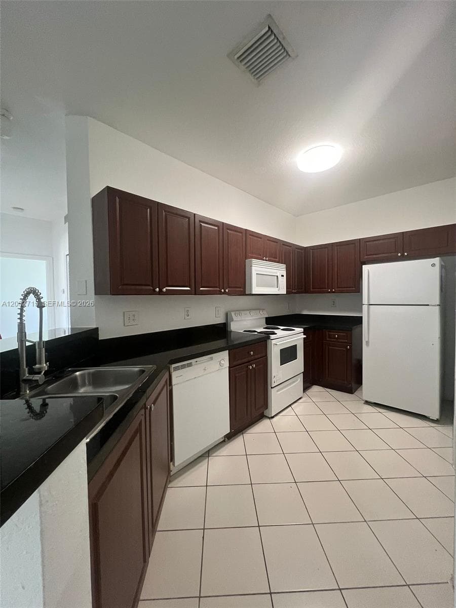 SHOMA HOMES AT COUNTRY CL · #206-7 in Hialeah - Photo 2