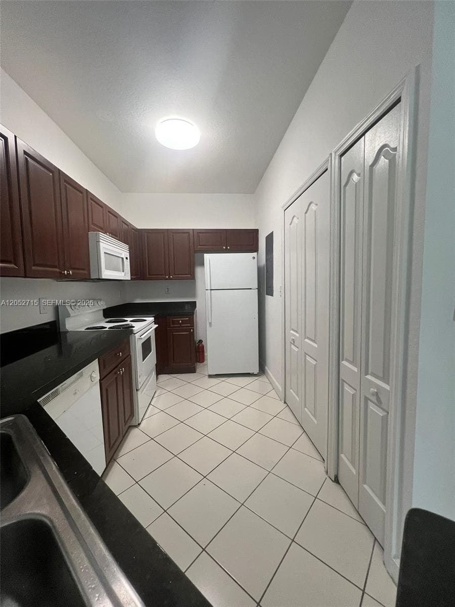 SHOMA HOMES AT COUNTRY CL · #206-7 in Hialeah - Photo 1