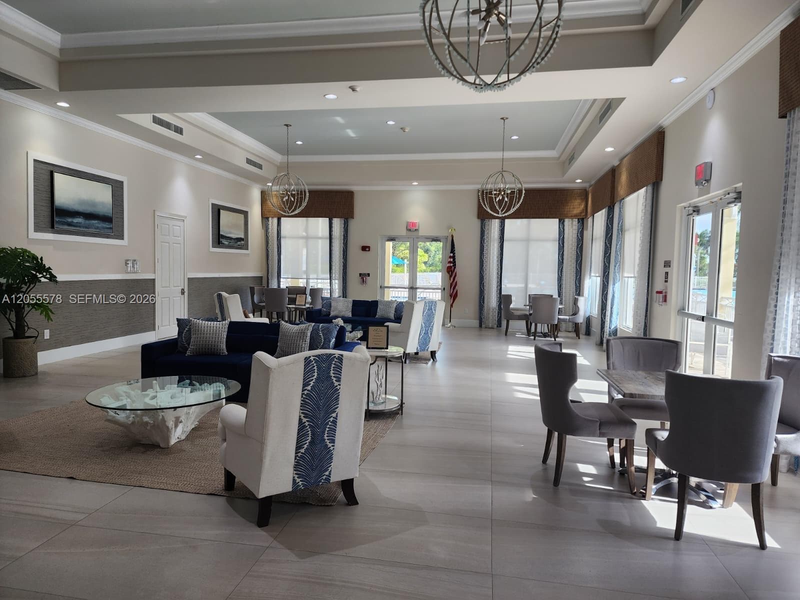 Welcome to the elegant community clubhouse. A sophisticated and welcoming space available for resident events for a nominal fee, designed to greet your guests with distinction.