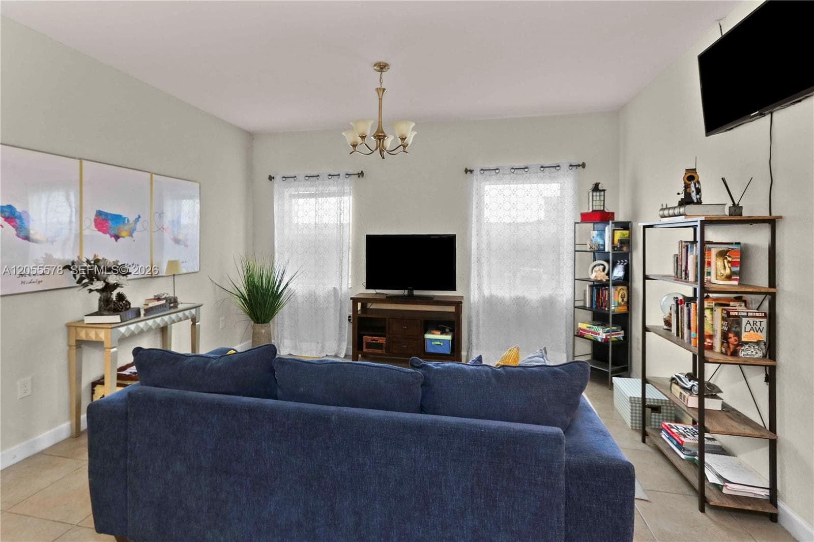 Bright and inviting, this additional living space offers a cozy retreat with plenty of natural light—the perfect spot to relax or entertain friends and family
