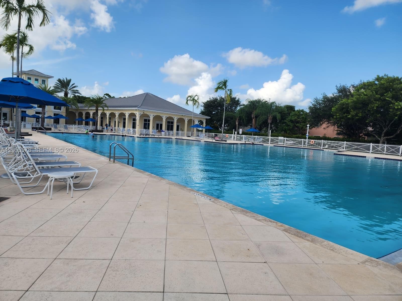 Resort-style living in your own community! Dive into luxury with this stunning, oversized community pool surrounded by ample lounge space, perfect for soaking up the Florida sun and relaxing outdoors.