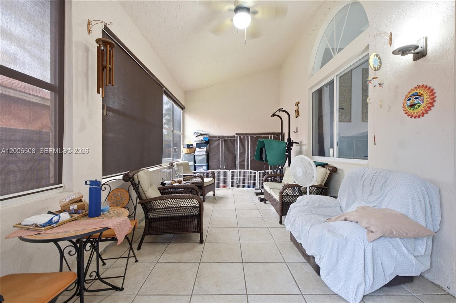 Florida Room enclosed additional 20'.3" X 10'.5"sq. ft. under roof