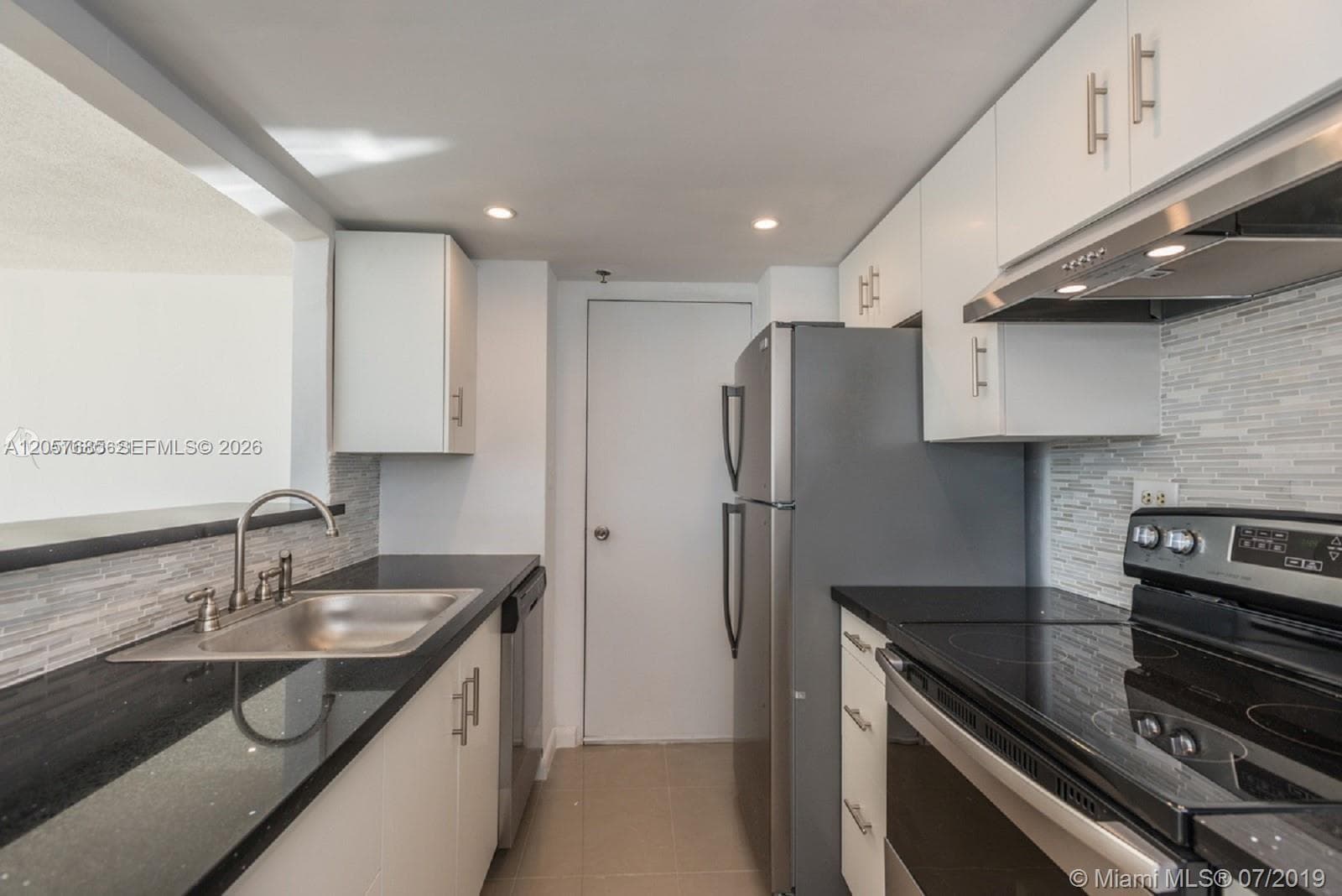 CARIBBEAN TOWERS CONDO · #2H in North Bay Village - Photo 10