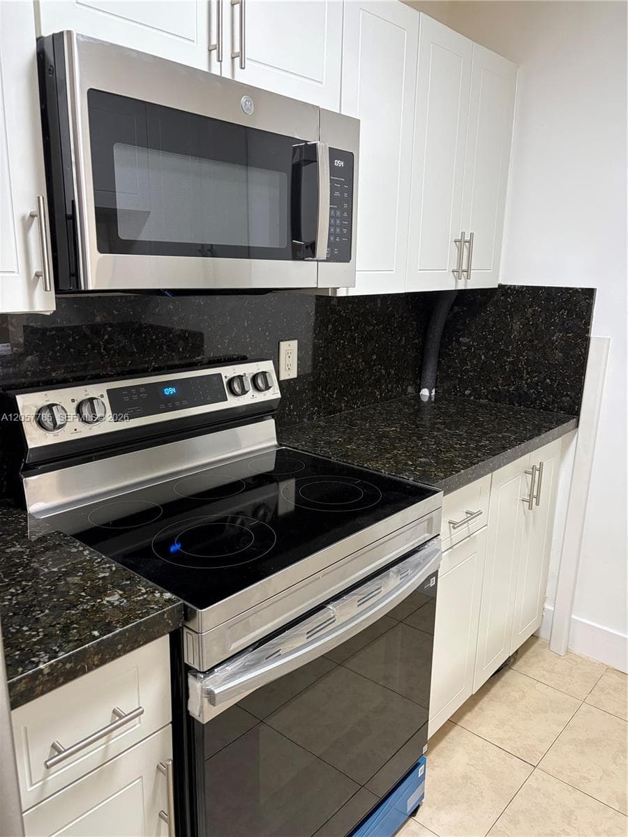 LAGO GRANDE CONDO THREE B · #56-22 in Hialeah - Photo 10