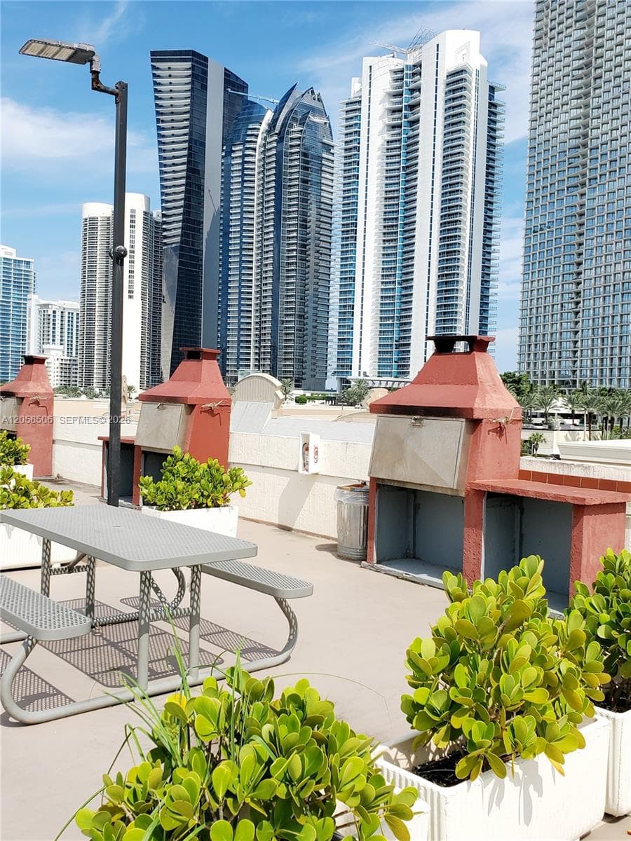 PLAZA OF AMERICAS CONDO P · #618 in Sunny Isles Beach - Photo 1