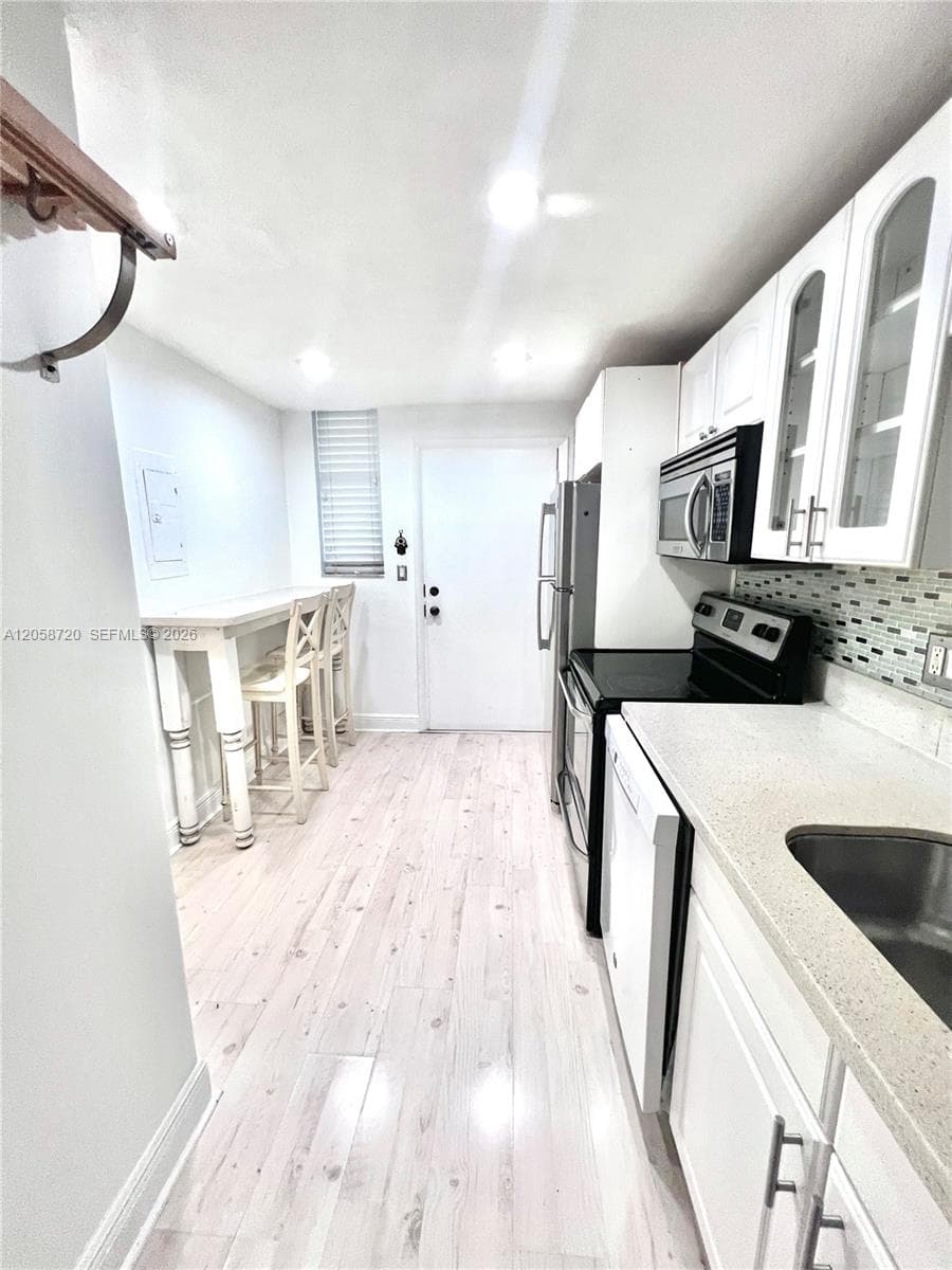 WHITE HOUSE CONDO · #405 in North Miami Beach - Photo 2