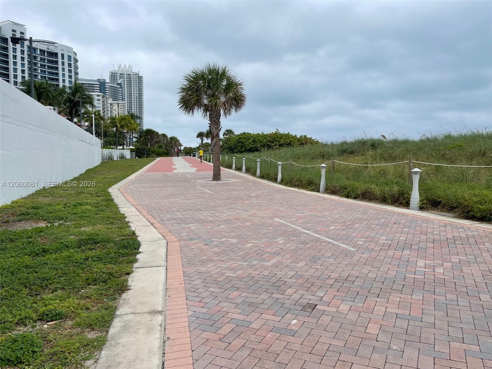 Beach boardwalk behind building