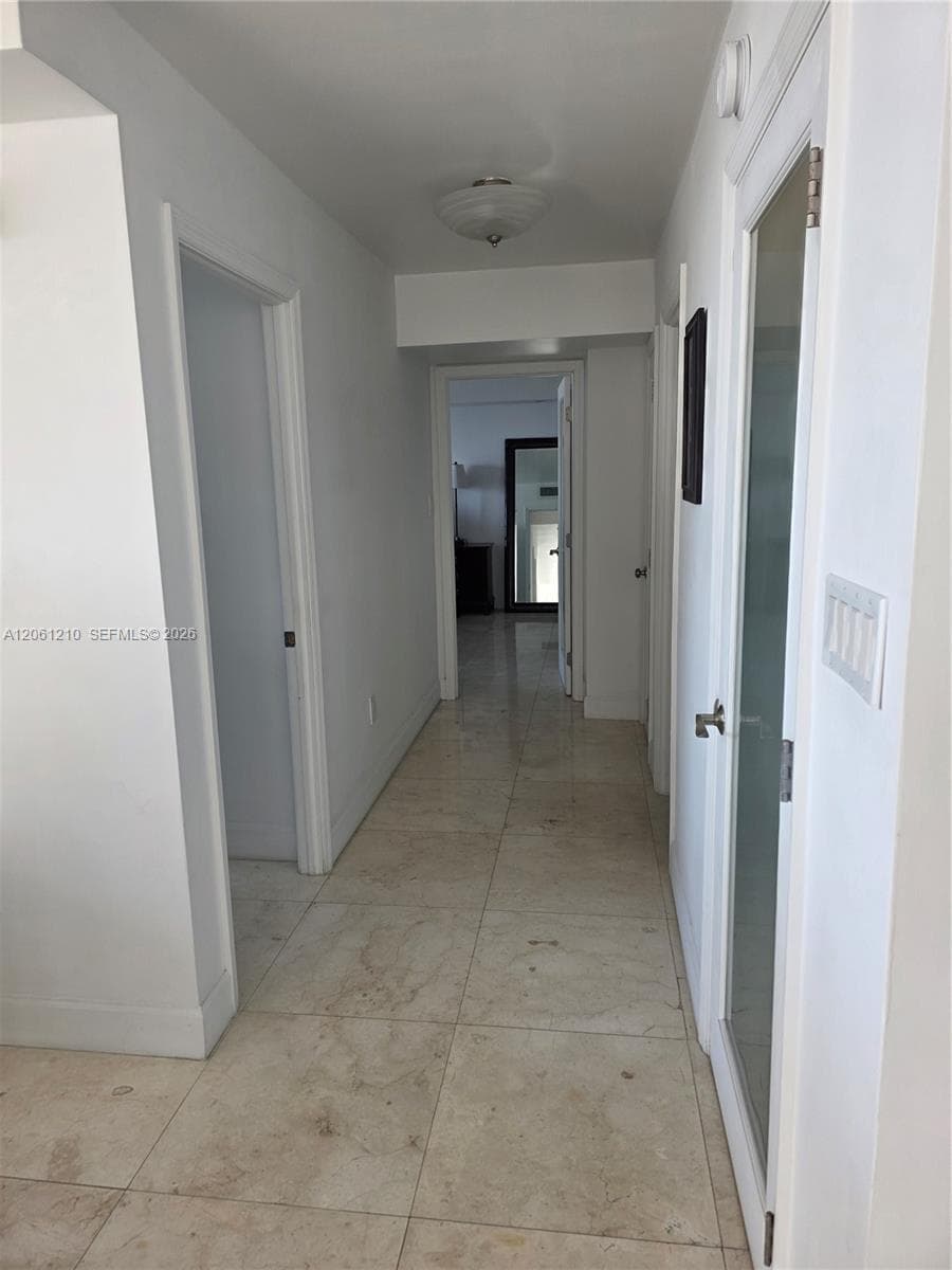 Hallway to bedrooms and bathrooms
