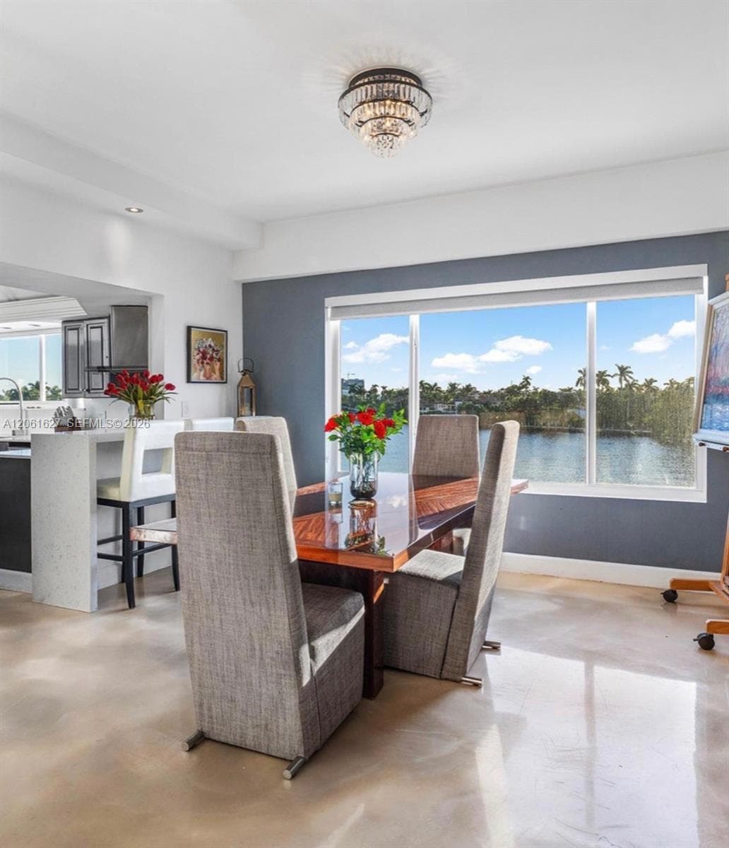 Dining Area Off Kitchen and Living Room with Coffee Bar.