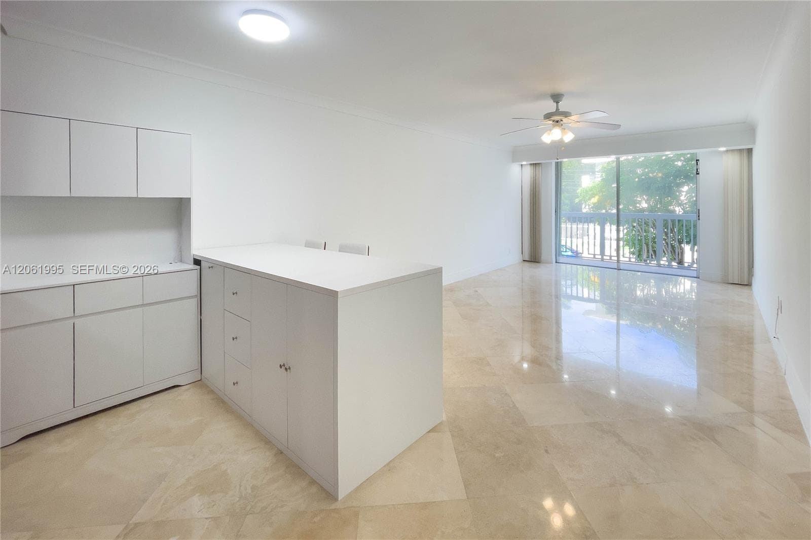 Fresh and bright living room and open kitchen