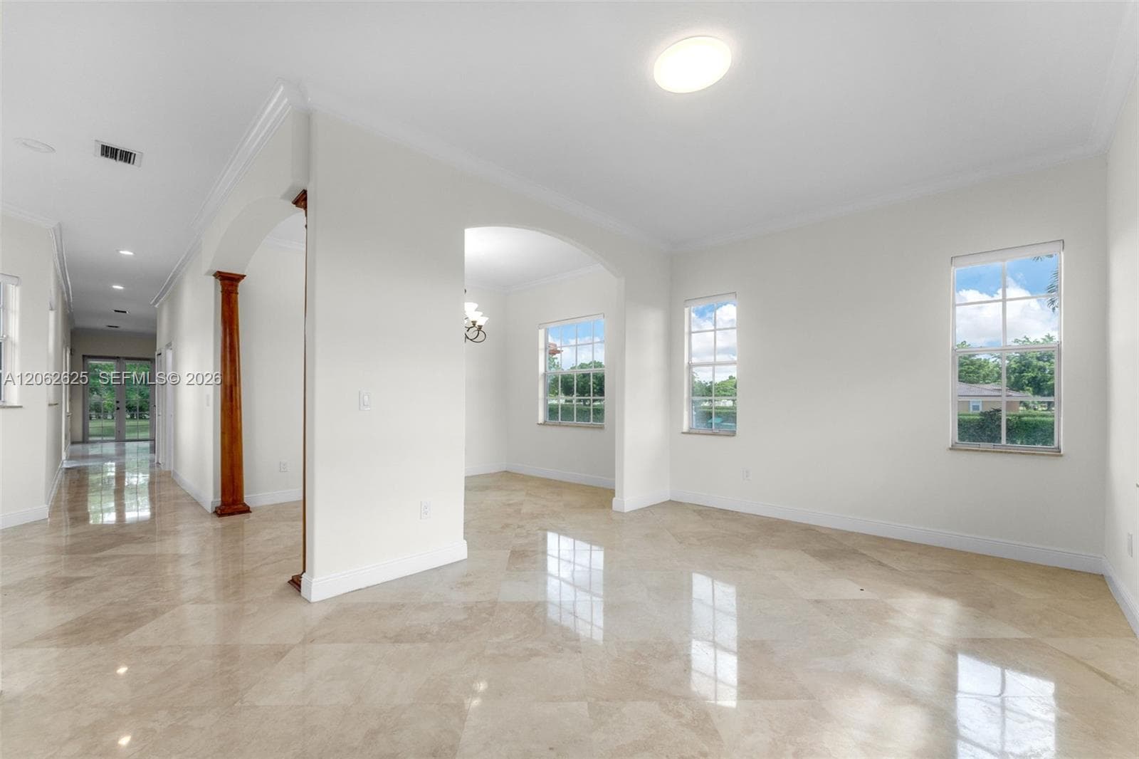 VIEW OF REAR DOOR OFF KITCHEN/PLUS..LIVING AND DINING ROOM.