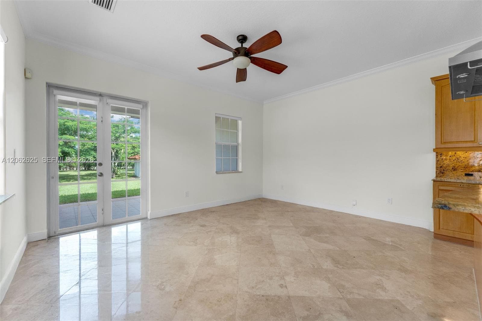 BEEN USED AS MEDIA ITS OFF KITCHEN THAT OPENS TO REAR DOORS WITH WALKWAY TO CARPORT OR COURTYARD..