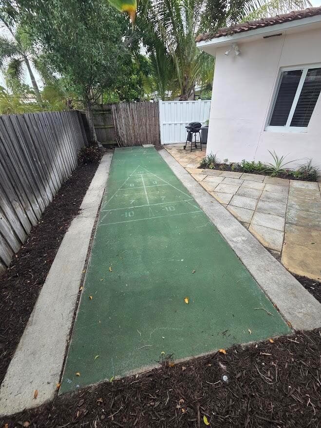 Shuffle board area in backyard