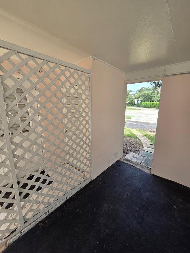 Carport entry to sidewalk and front of u