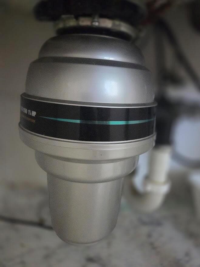 Garbage Disposal under Kitchen Sink