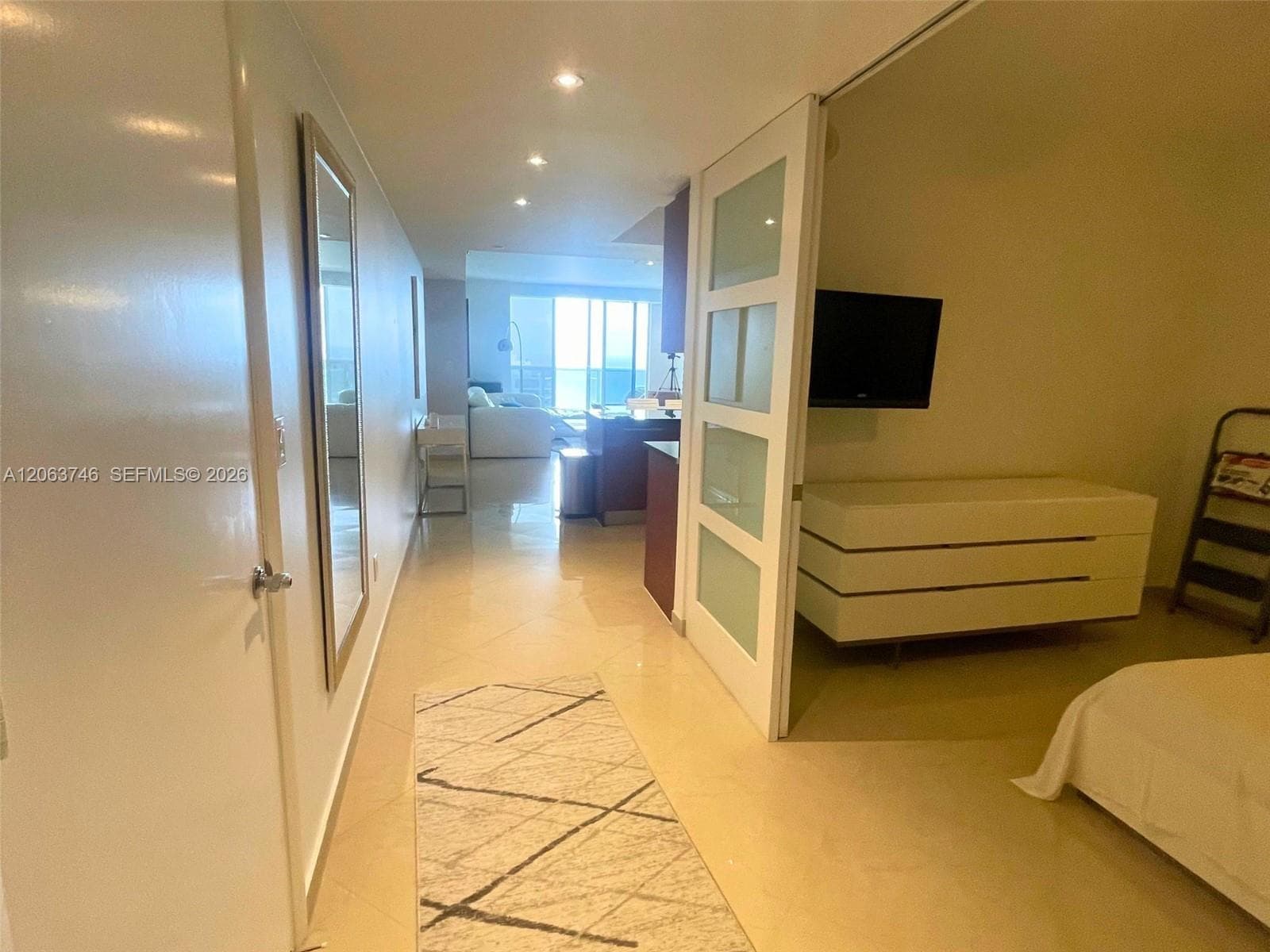 Foyer & third bedroom