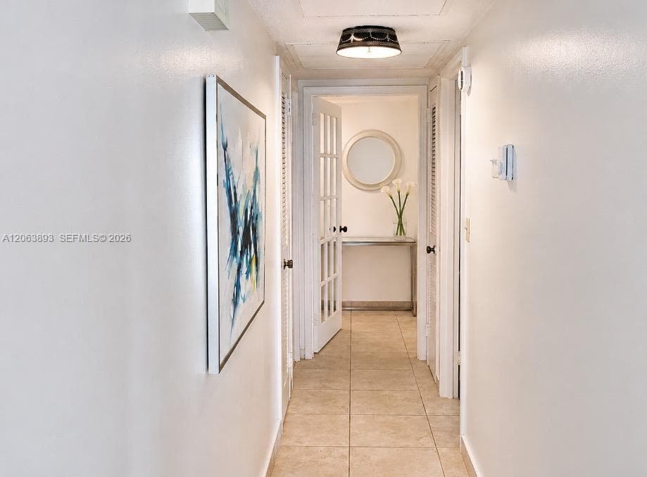 HALLWAY LEADING TO BEDROOMS