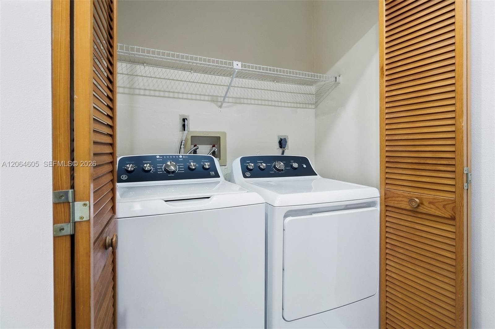 Laundry Room with new washer and dryer