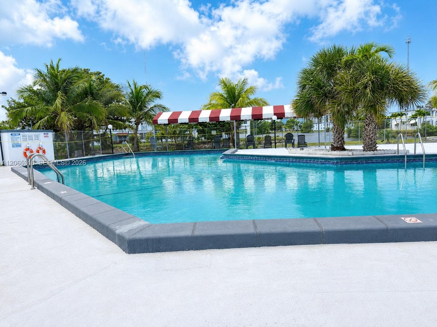 Community swimming pool offering residents a relaxing place to enjoy the South Florida lifestyle.