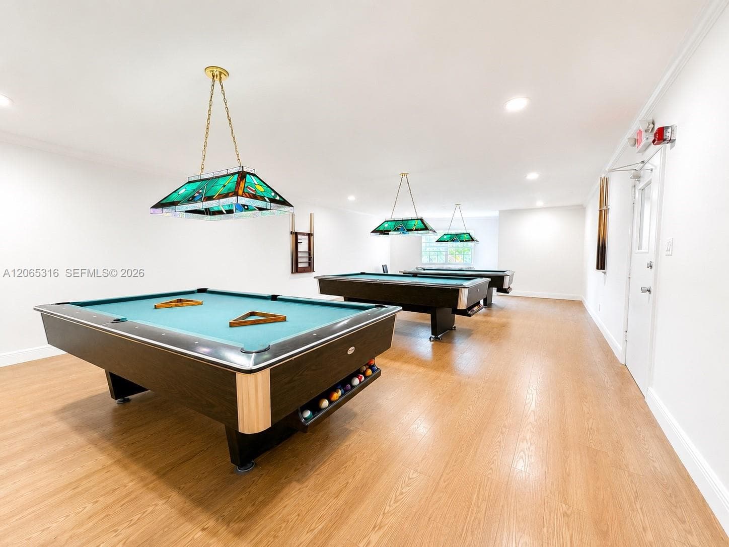 Clubhouse game room designed for recreation and social activities.