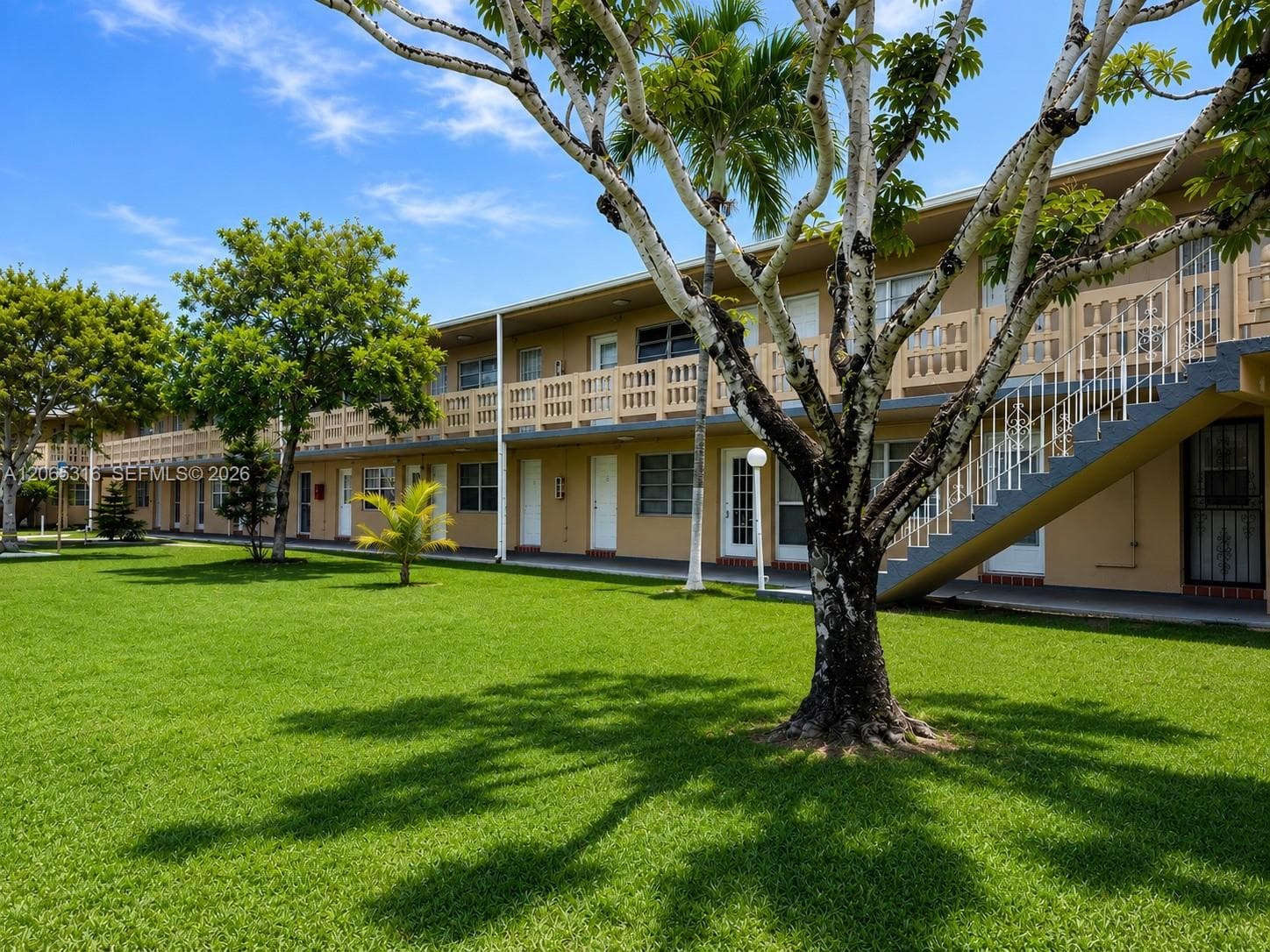 Peaceful walking paths surrounded by well-maintained landscaping.