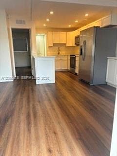 View from your front door - Notice the recessed lighting in the kitchen