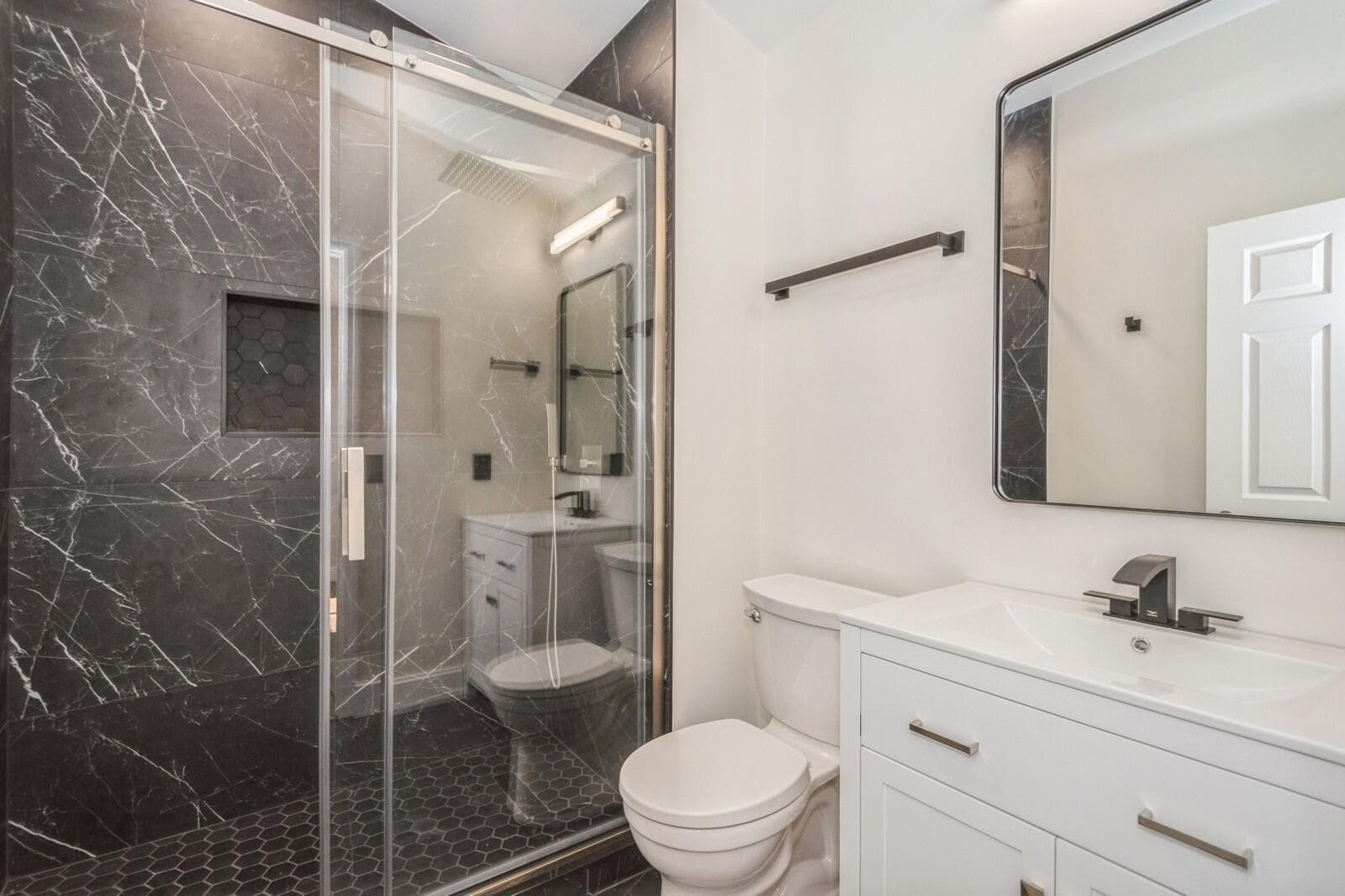 34_5504FoxHollowDr_9_2ndBathroom_Large