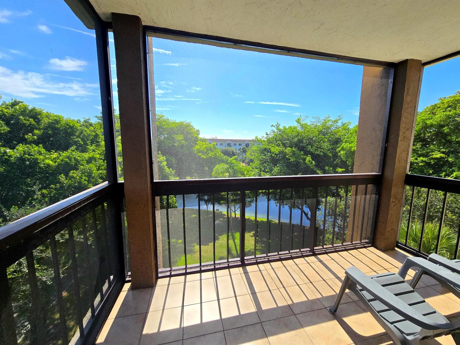 HUGE patio with lake and park-like views