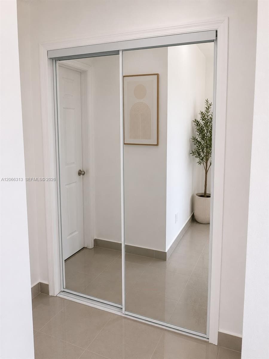 The unit is UNFURNISHED- This photo is VIRTUAL STAGED FOR VISUALIZATION
