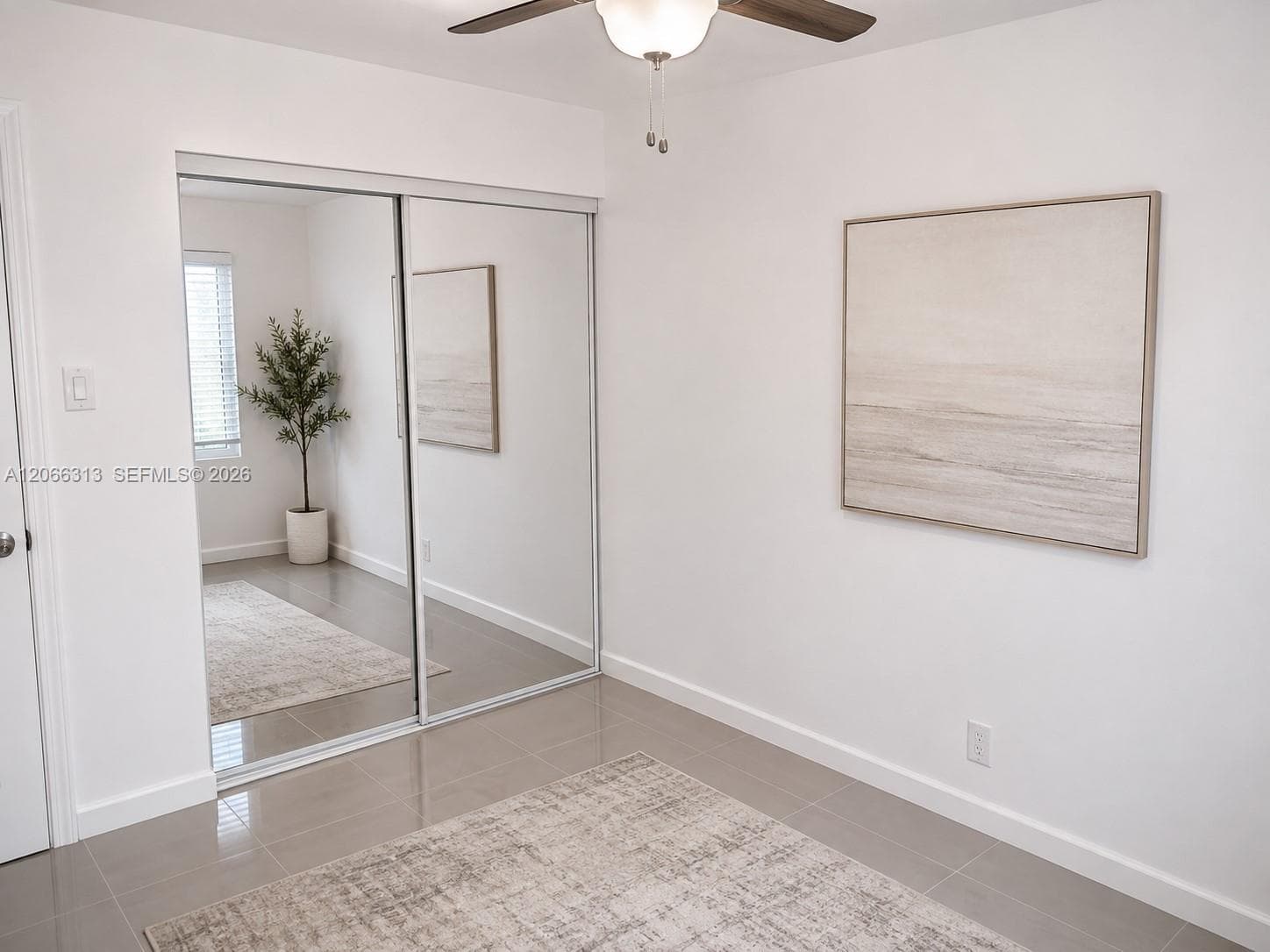 The unit is UNFURNISHED- This photo is VIRTUAL STAGED FOR VISUALIZATION