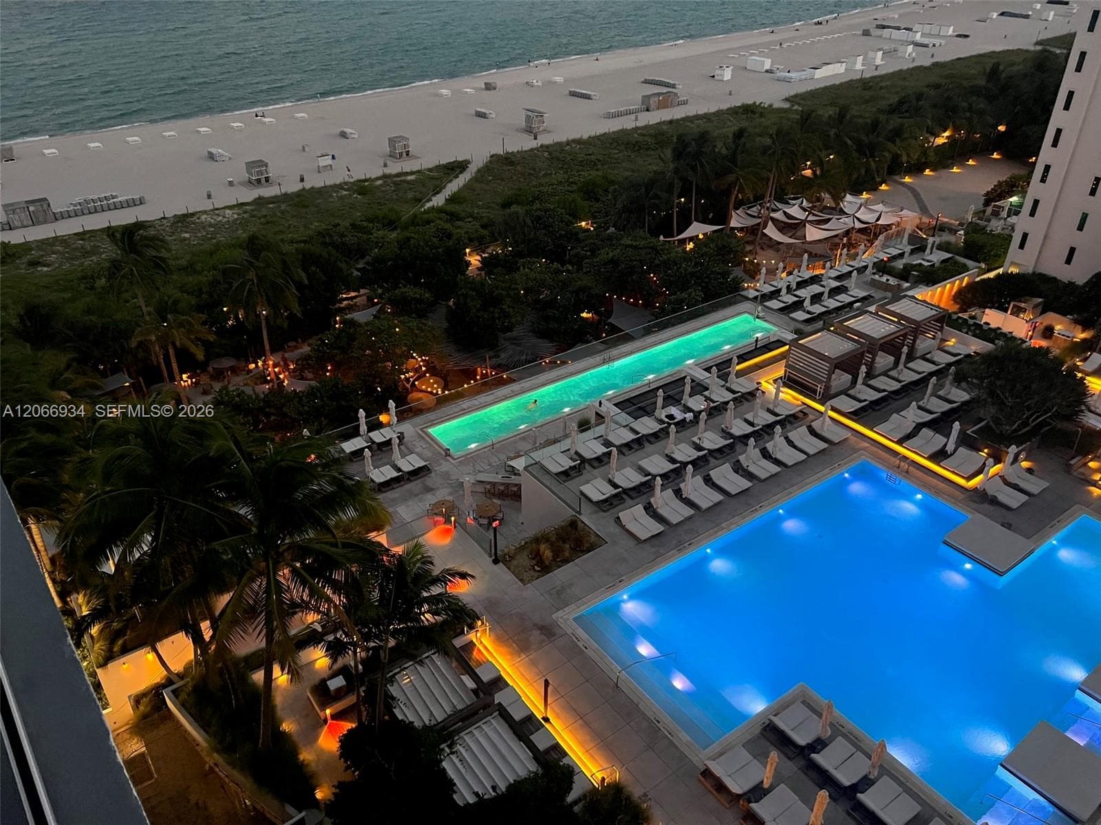Evening lights at the center pool