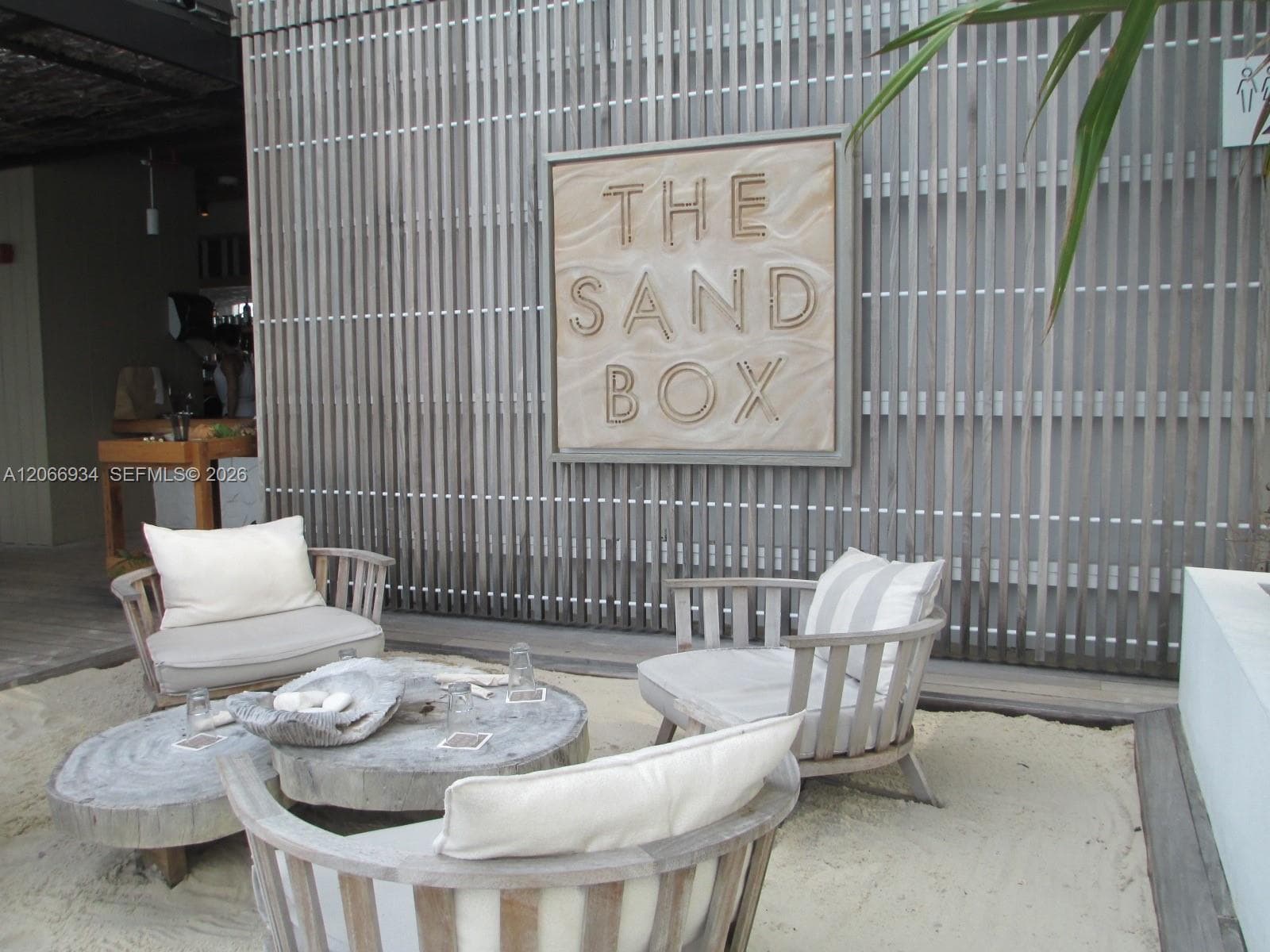 Sand Box dining at poolside.