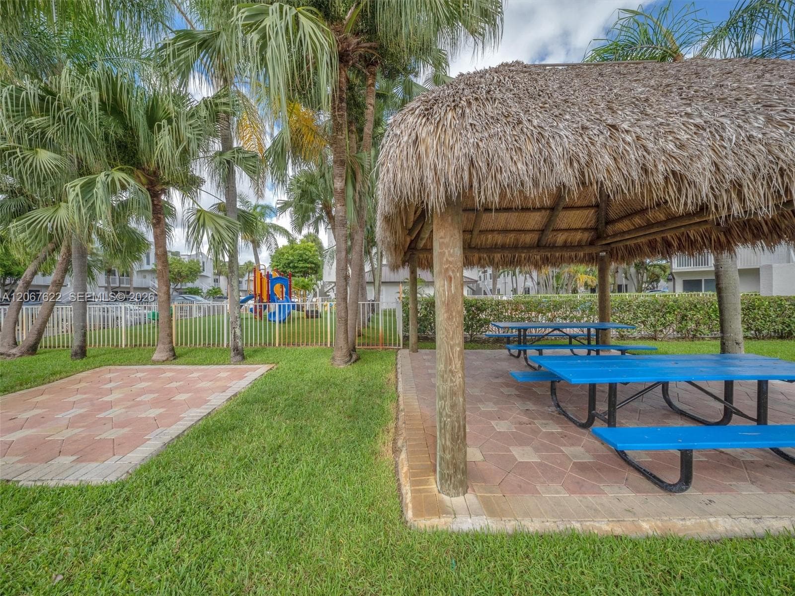 Covered seating area adjacent to the children's playground