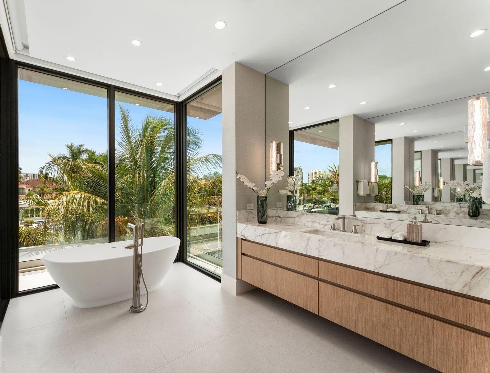 Freestanding stone-composite soaking tub
