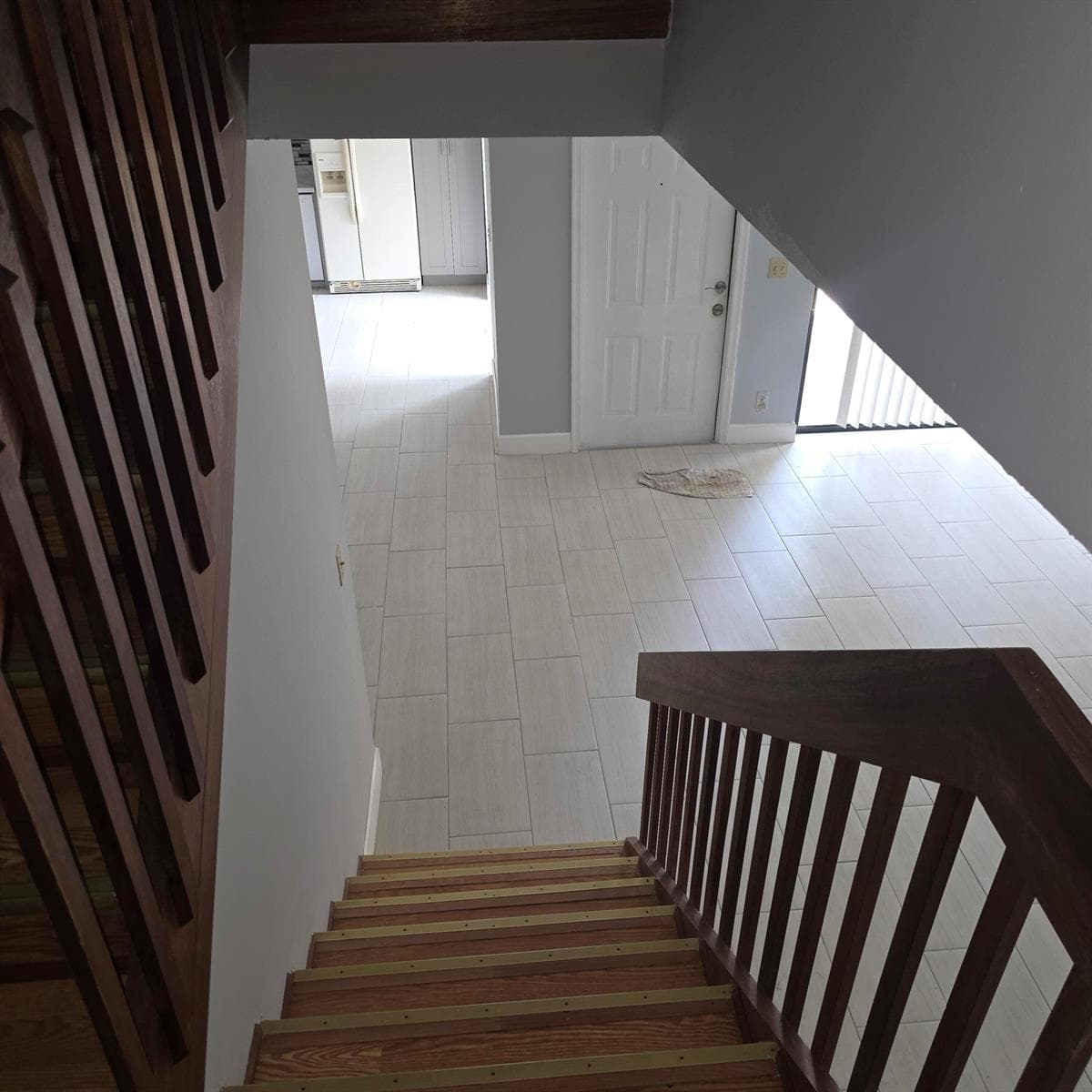 View of front door from stairway