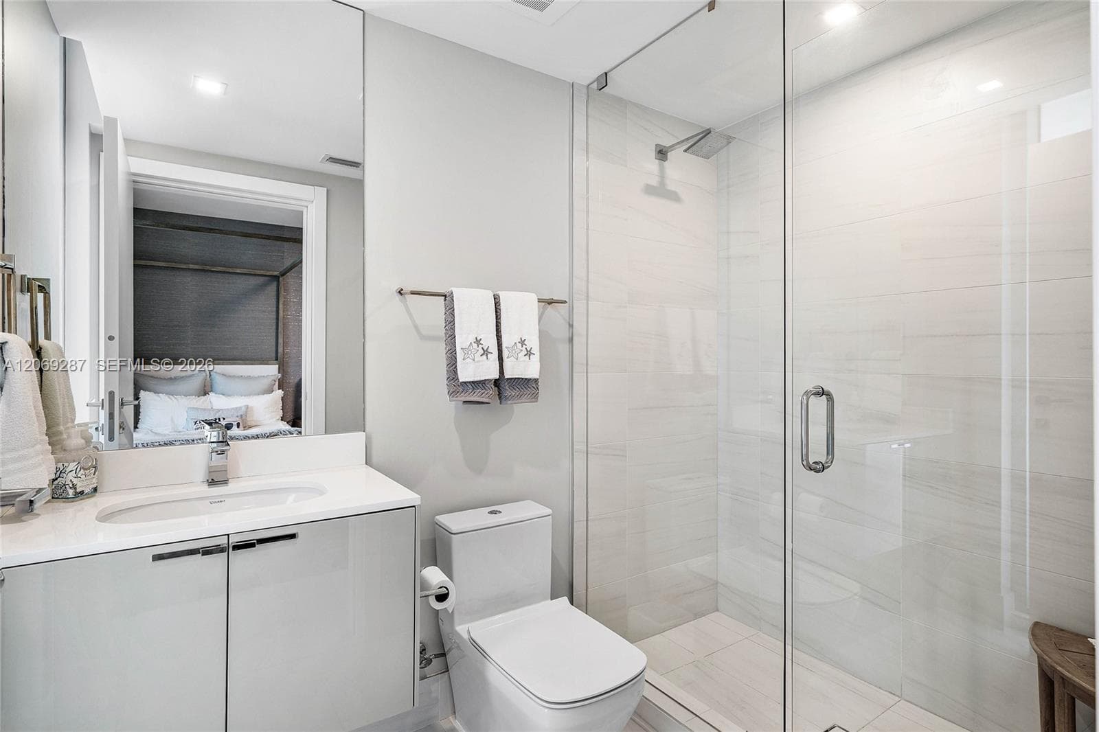 A well-appointed third bedroom with a private en-suite bathroom, providing comfort and privacy