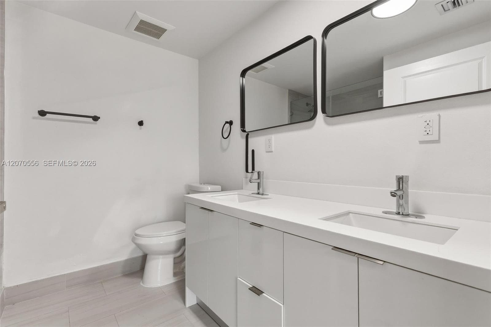 A spacious double vanity gives you extra counter space, storage, and room to make busy mornings feel a little easier.