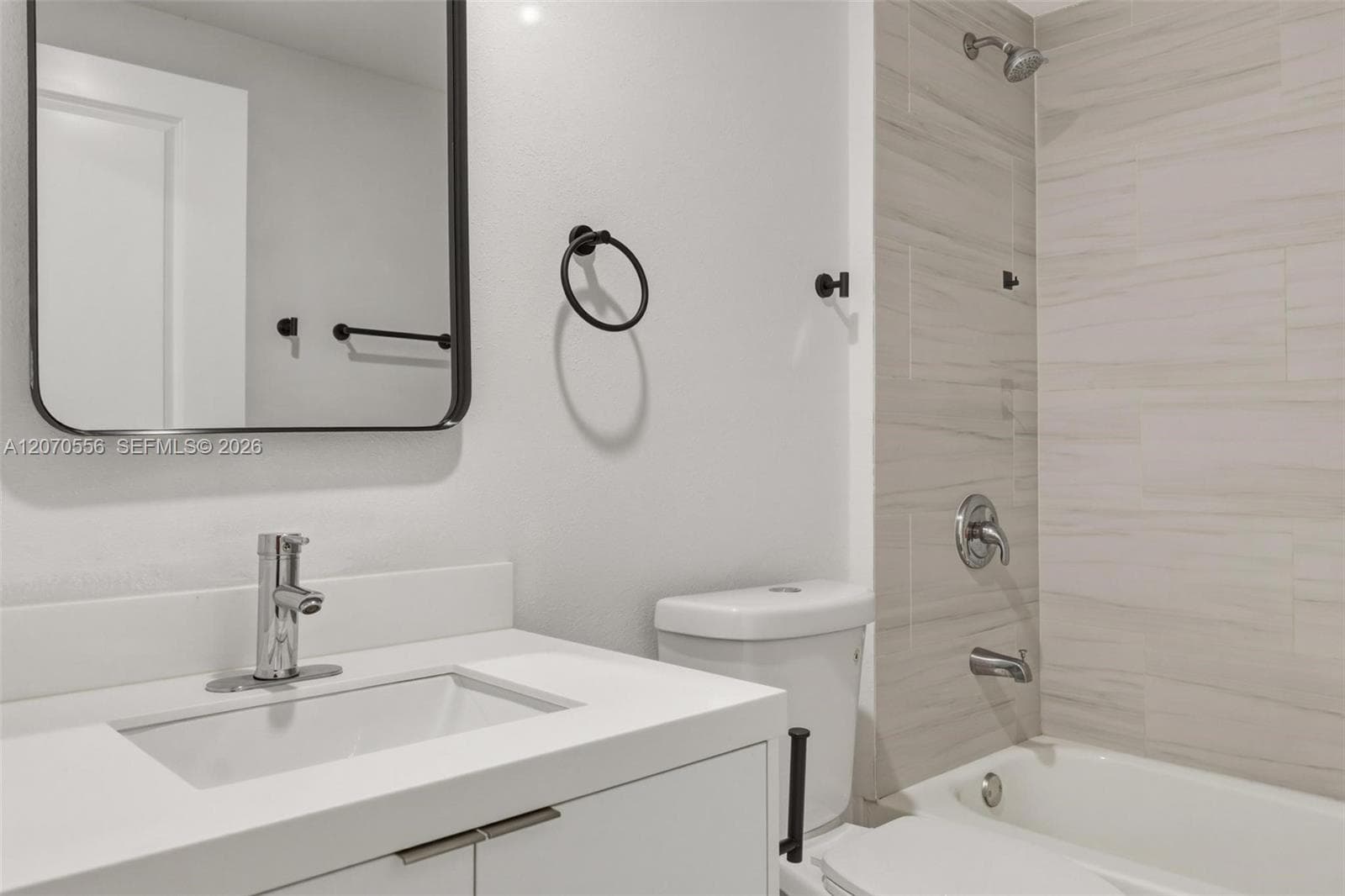 Clean, bright, and thoughtfully finished with a full bathtub and shower.