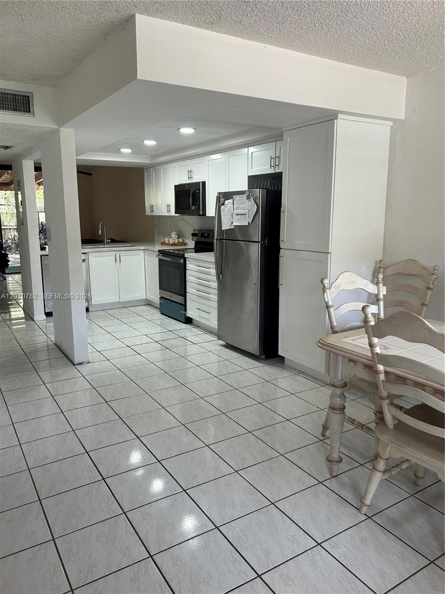12242 SW 16th Ter # L #102-L photo 3