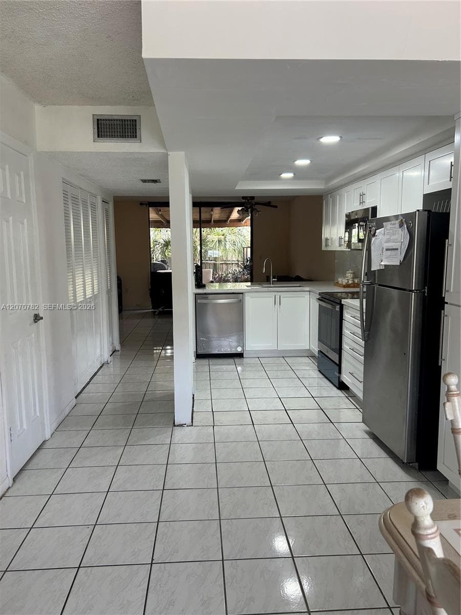 12242 SW 16th Ter # L #102-L photo 1
