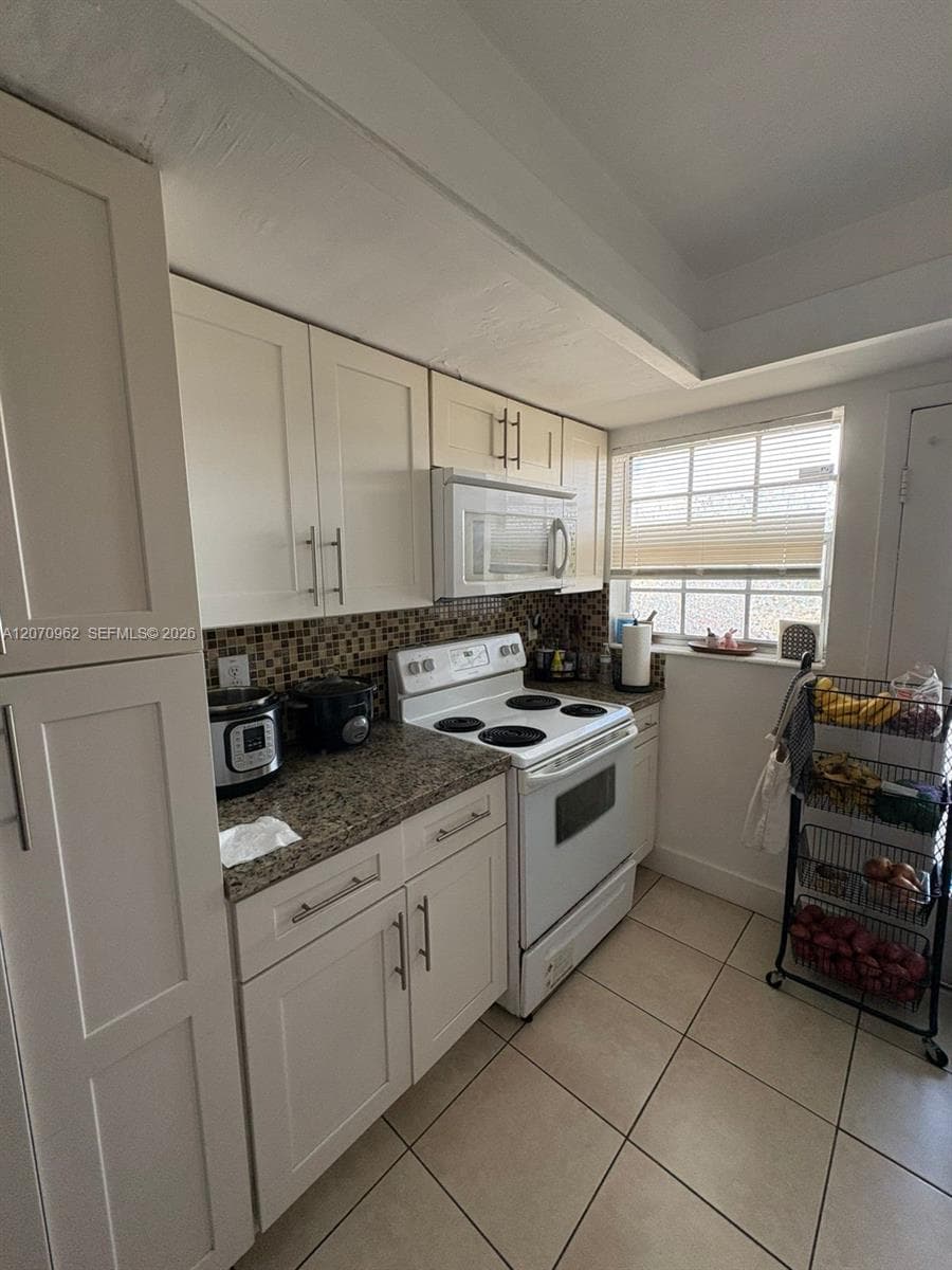 SUTTON HOUSE CONDO · #14 in North Miami - Photo 1
