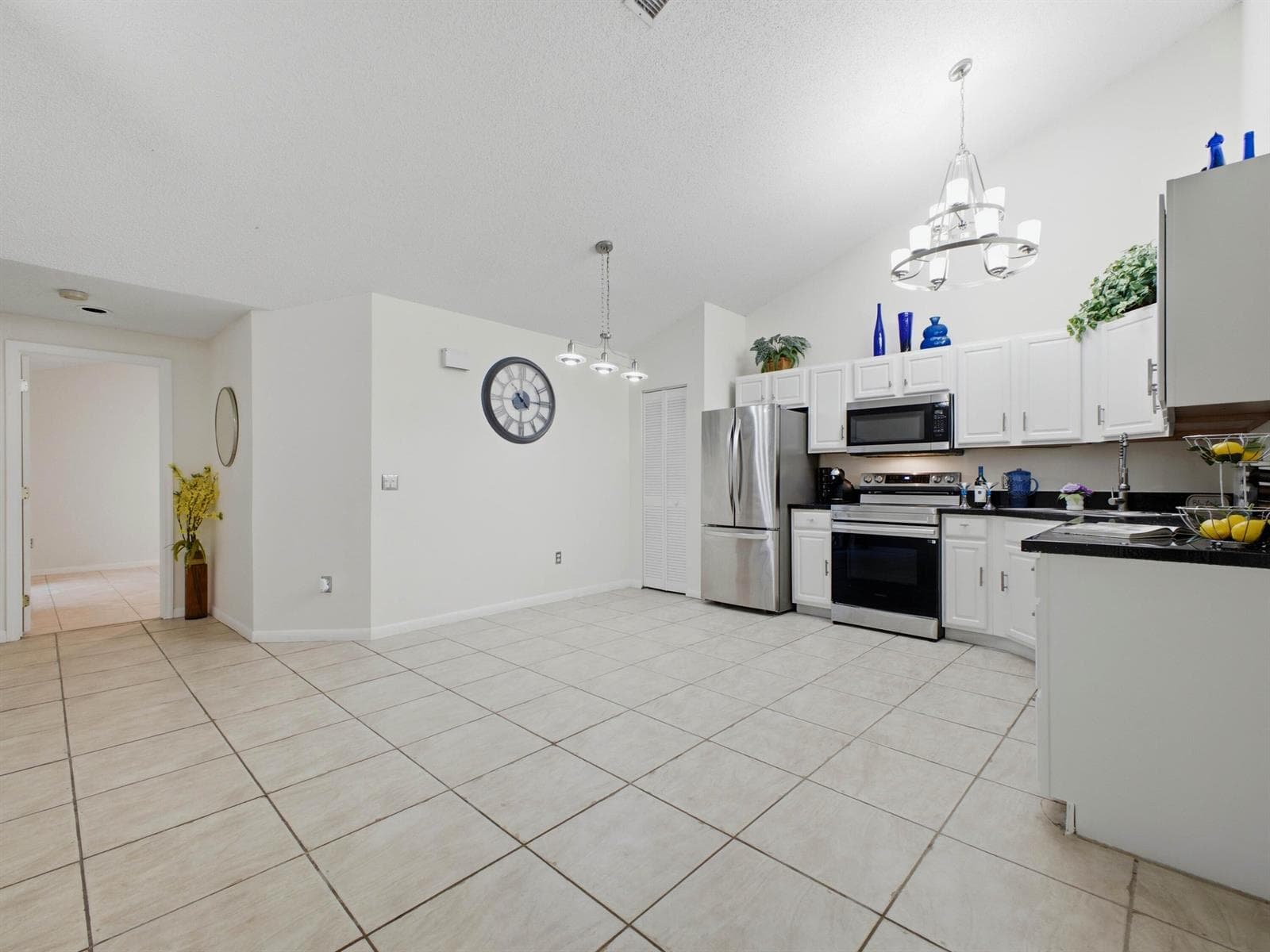 Eat-in Kitchen to Foyer