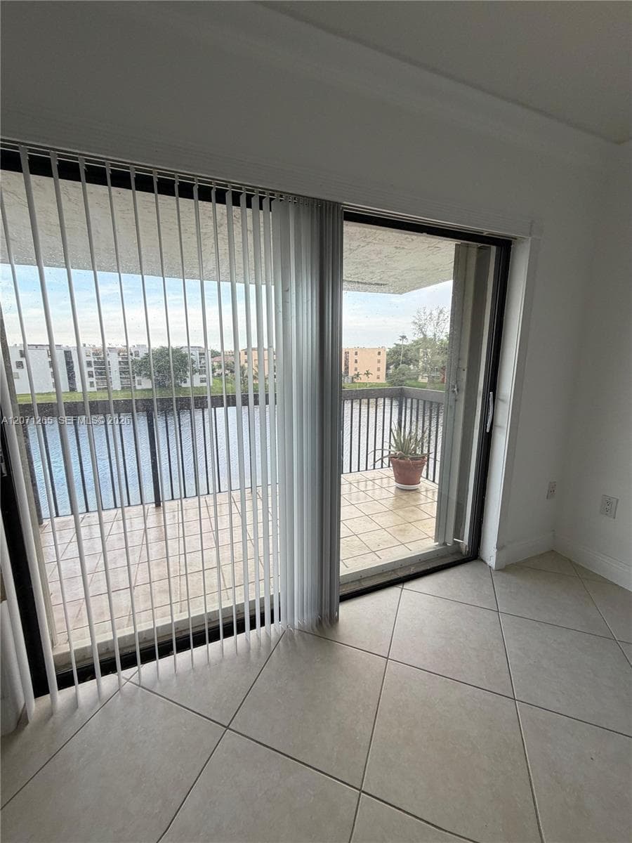 Master Bedroom balcony access and lake view
