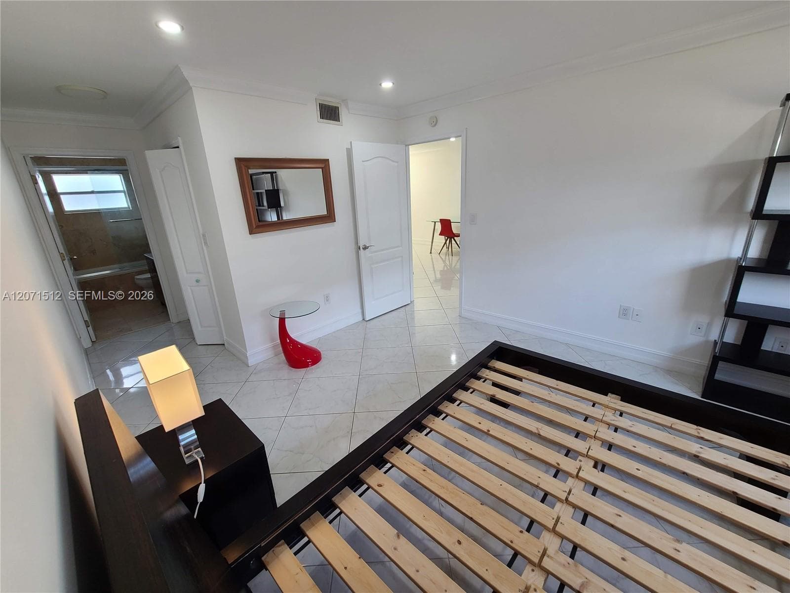On-suite bathroom and hallway with walk-in closet