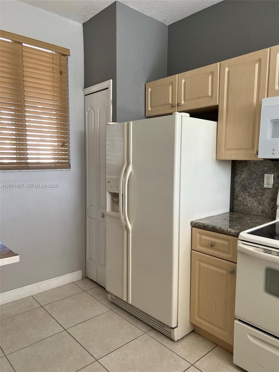 SHOMA HOMES AT COUNTRY CL · #203-4 in Hialeah - Photo 6
