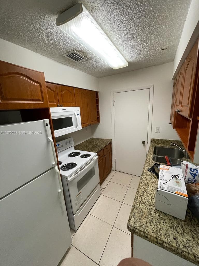 ANTIGUA AT CNTRY CLUBOF M · #E-22 in Hialeah - Photo 3