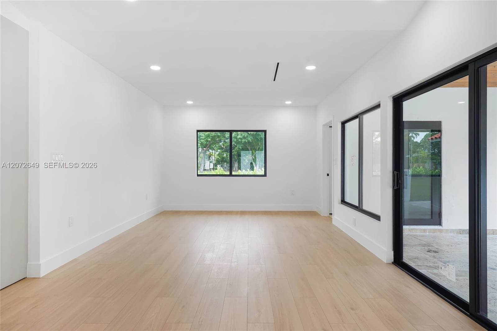 Family room with view to the pool and Conveniently located close to the cabana bathroom