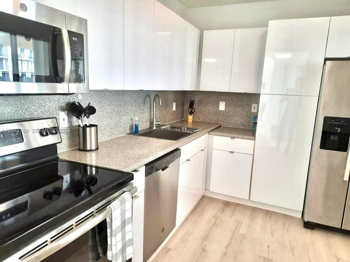 SURFSIDE PALMS CONDO · #512 in Surfside - Photo 10